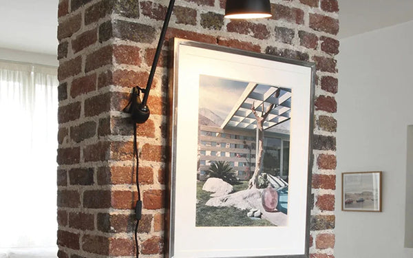 Luminaire style industriel métal noir dans un loft — Candela Luminaires