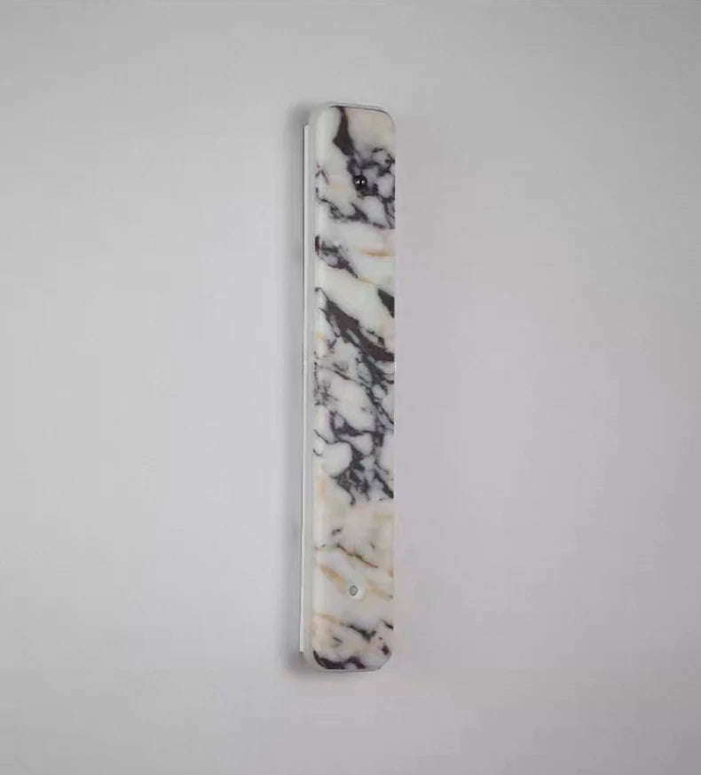 Paël Cylindre Marbre Blanc et Noir Épuré