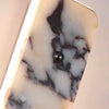 Paël Cylindre Marbre Blanc et Noir Épuré