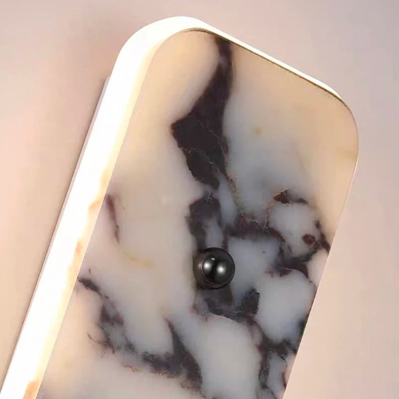 Paël Cylindre Marbre Blanc et Noir Épuré